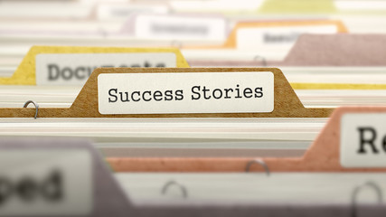Success Stories Concept on Folder Register in Multicolor Card Index. Closeup View. Selective Focus. 3D Render. - obrazy, fototapety, plakaty