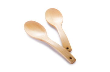 Many wooden spoons isolated on white