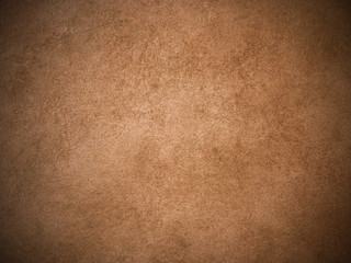 Brown leather texture closeup. Useful as background.