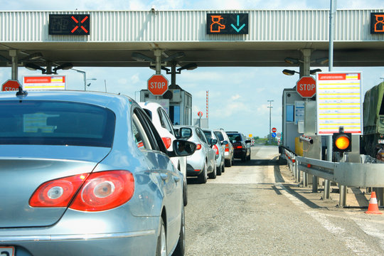 highway traffic jam on pay toll station