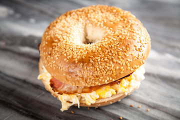 Bagel with bacon and egg
