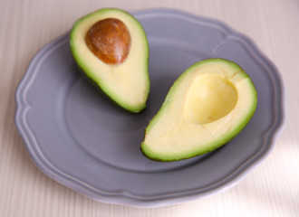 Fresh sliced avocado on plate