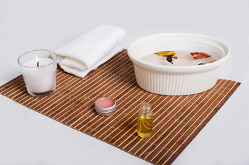 skin care items on bamboo mat