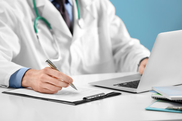 Doctor working on a computer in hospital