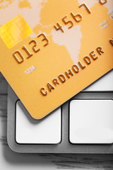 Credit card on keyboard, closeup