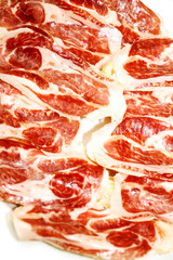 Sliced jamon iberico spanish cured ham cut