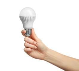 Woman hand holding bulb, isolated on white