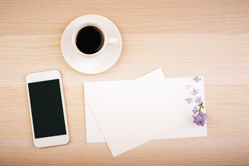 Coffee, phone and blank cards