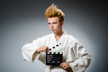 Funny karate fighter in sports concept