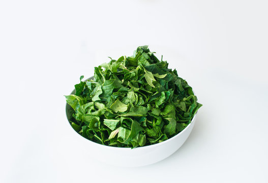 Fresh spinach isolated on white