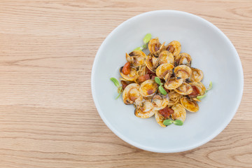 delicious dish of spicy pasta with shellfish and Sunflower sprou