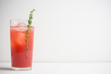 Cocktail made of Sicilian orange on the rustic wooden background