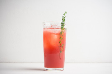 Cocktail made of Sicilian orange on the rustic wooden background