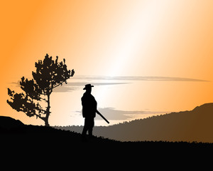 Fototapeta na wymiar silhouette of a hunter. concept background.