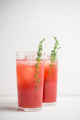 Cocktail made of Sicilian orange on the rustic wooden background