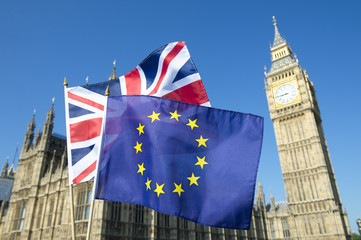 European Union and British Union Jack flag flying in front of Big Ben and Westminster Palace,...