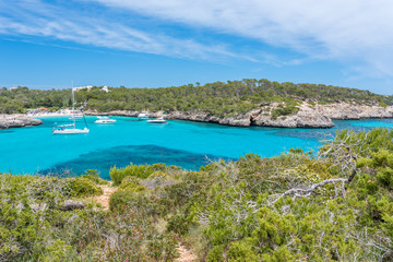 Naklejka na ściany i meble Sailing boats at Cala Mondrago - beautiful beach and coast of Mallorca