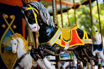 Carousel with Horses on a carnival Merry Go Round