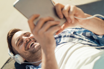 Smiling man with headphones