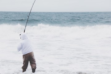 fishing at the beach with strong wind