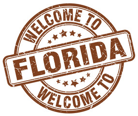 Obraz premium welcome to Florida brown round vintage stamp