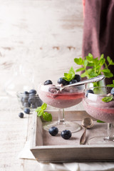 Glass of homemade healthy blueberry dessert