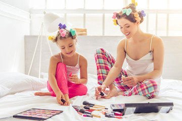Mom and daughter playing