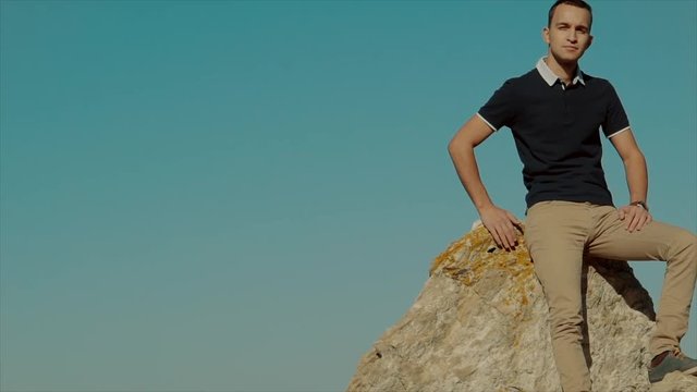 A beautiful young man turns his head in the sky, The average plan