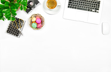 Creative feminine home office workplace Coffee macaroon cookies