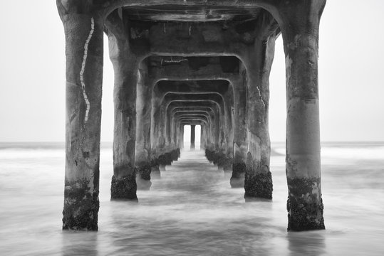 Under the Pier. Black and white photo Manhattan Beach, Californi