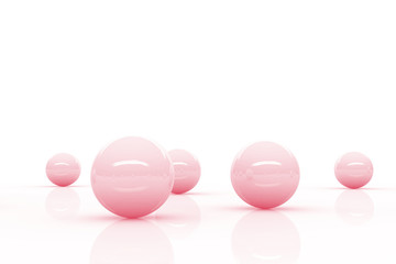 five pink reflective spheres blending into a bright white environment