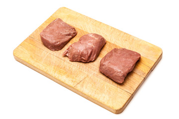 Cooked Ostrich meat steaks.