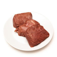 Cooked Ostrich meat steaks.