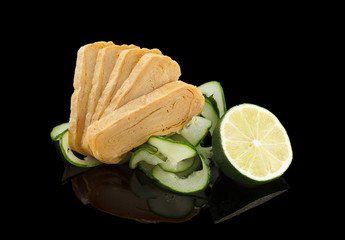 Tamago sashimi over black background