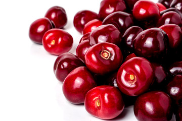 Red cherries isolated on a white background