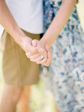 Young couple holding hands