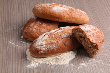 broken bread flour on gray wooden background