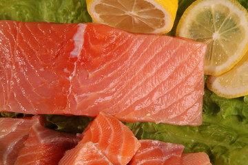 large piece of salmon with lemon