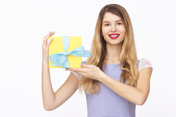 Young woman portrait holding gift