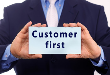 Obraz premium Business man hold paper customer first text on it