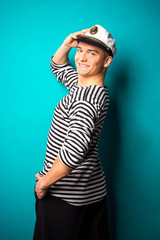 very attractive young man model dressed like a sailor - studio shoot