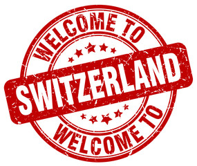 welcome to Switzerland red round vintage stamp
