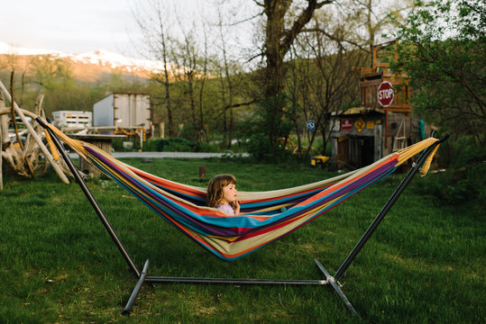 Young girl relaxing on hammock