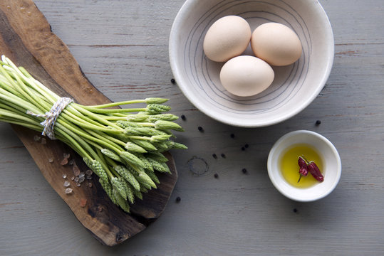 Overhead view of vegetables and eggs in bowl