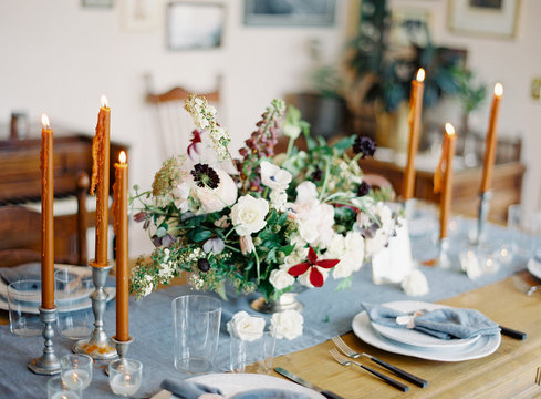 Table set for dinner with flowers and candles