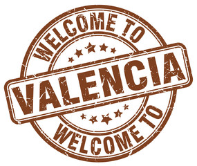 welcome to Valencia brown round vintage stamp