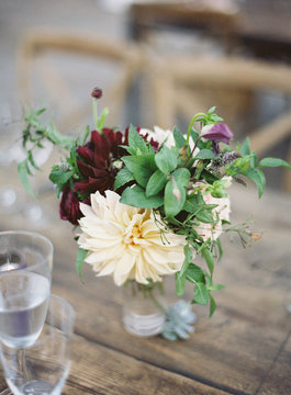 Fresh flowers on wooden table