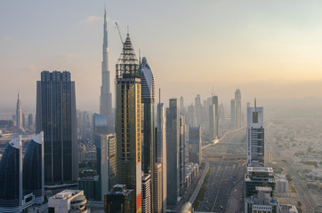 Fototapeta na wymiar Suset panorama Sheikh Zayed Road skyscrapers. 