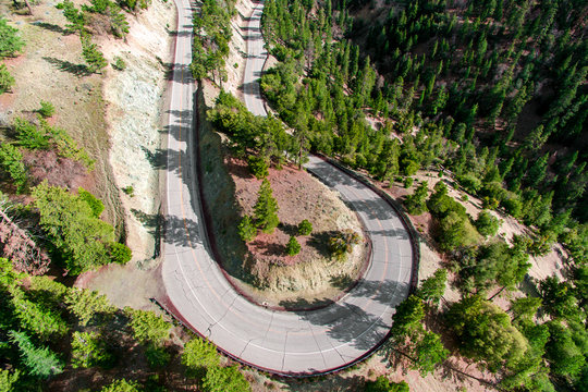 Aerial view of road through mountains