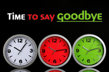 Round office clocks on black background